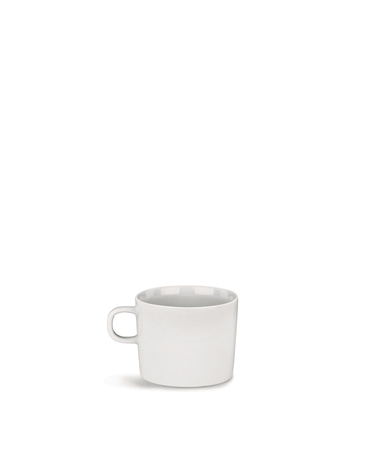 White cup by Alessi with a simple, modern design and handle, casting a shadow.