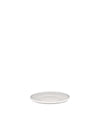 Light grey round ceramic plate by Alessi, angled view with a smooth glazed finish.