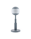 Matte gray and frosted white table lamp by Alessi with spherical diffuser and ribbed stem.