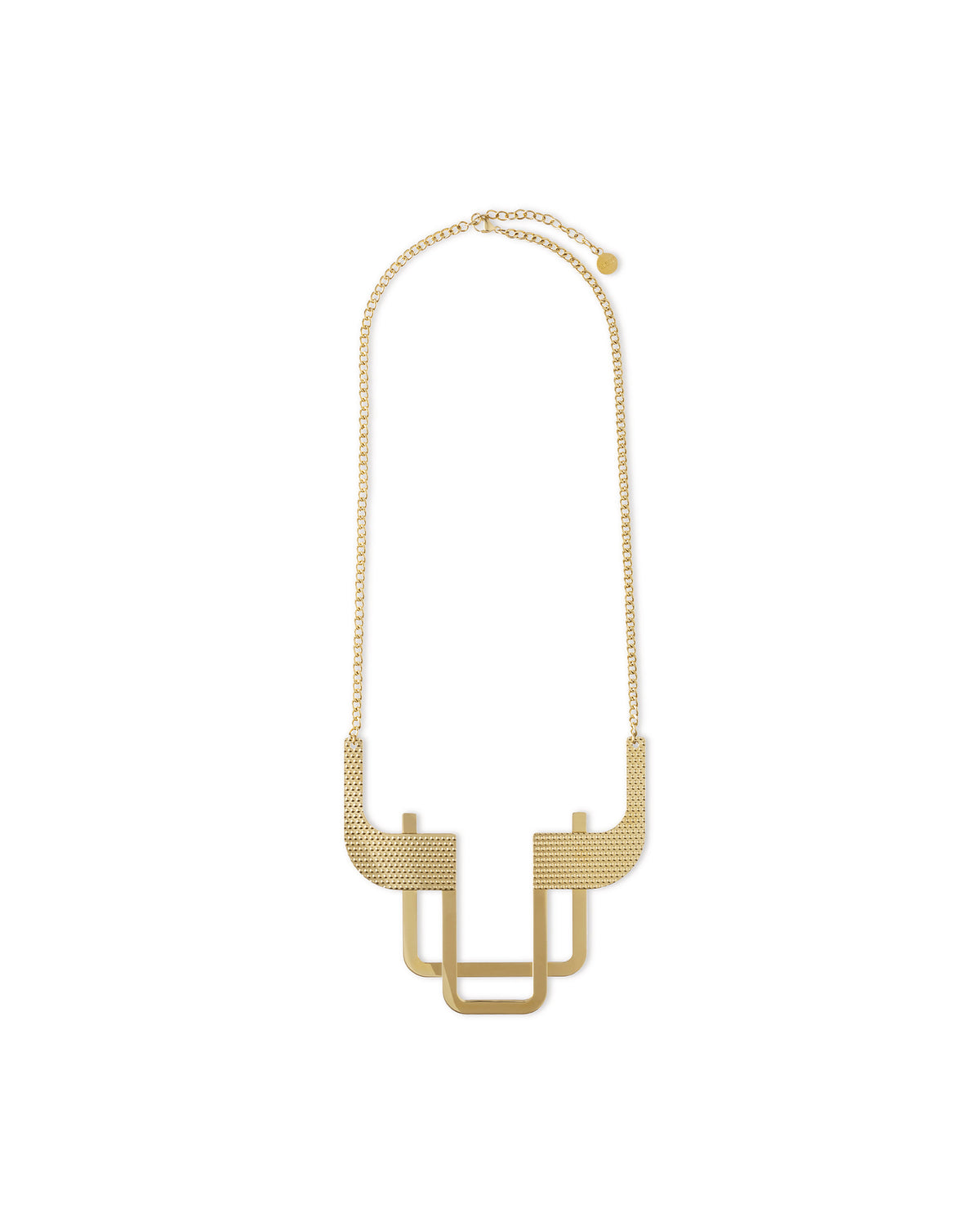 Gold-toned necklace by Alessi with a geometric pendant featuring textured, dotted surfaces and smooth square shapes.