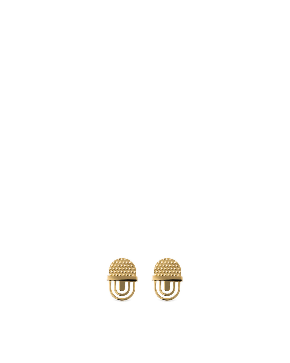 Pair of golden decorative studs by Alessi, with textured domed tops and a double U-shaped base.