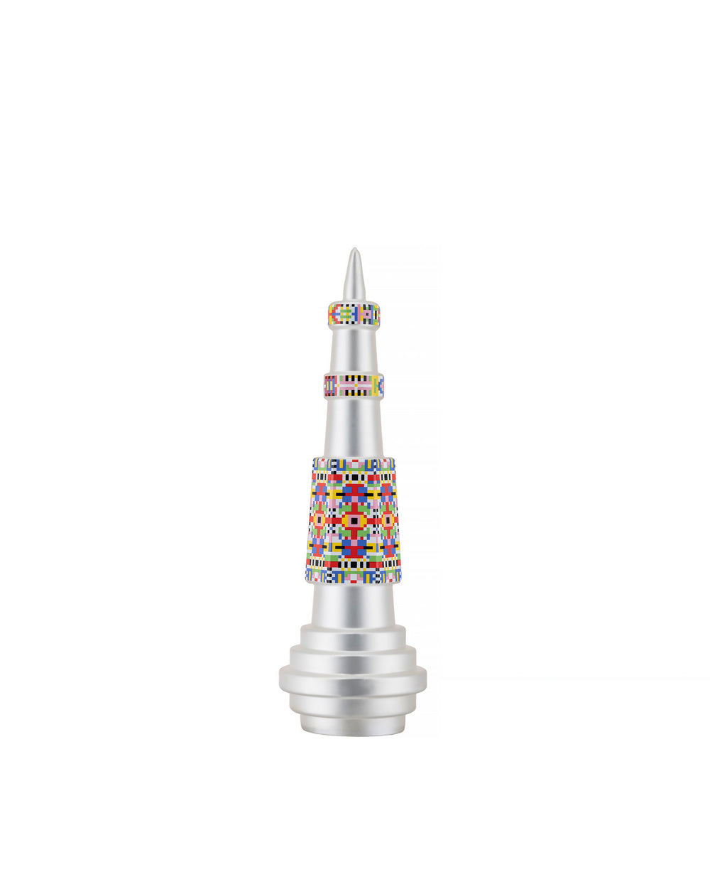Silver conical Christmas tree ornament by Alessi, featuring colorful geometric pixelated bands and a tiered base.