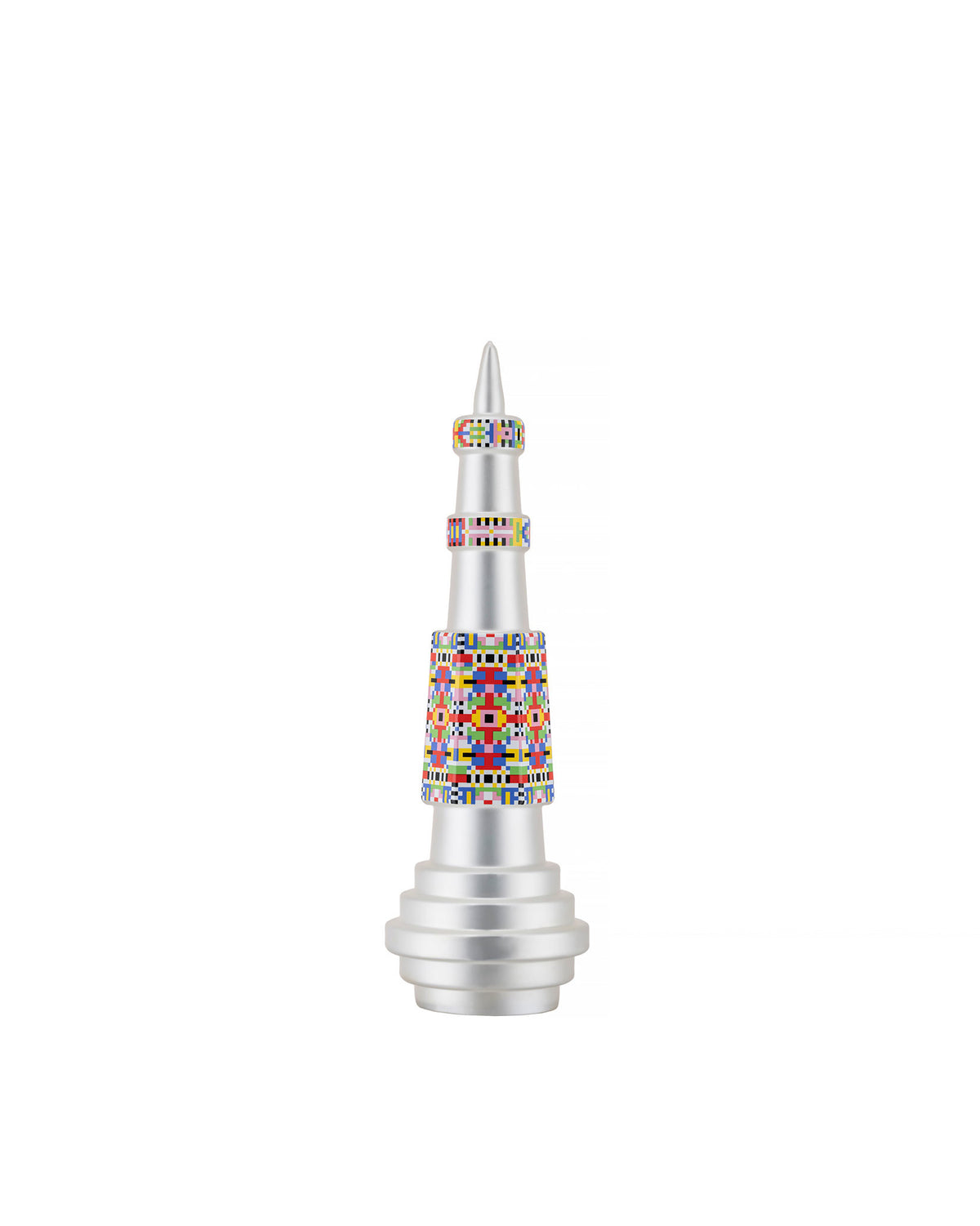 Silver conical Christmas tree ornament by Alessi, featuring colorful geometric pixelated bands and a tiered base.