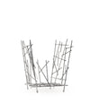 Silver metal fruit basket by Alessi, composed of scattered thin rods creating an abstract open design.
