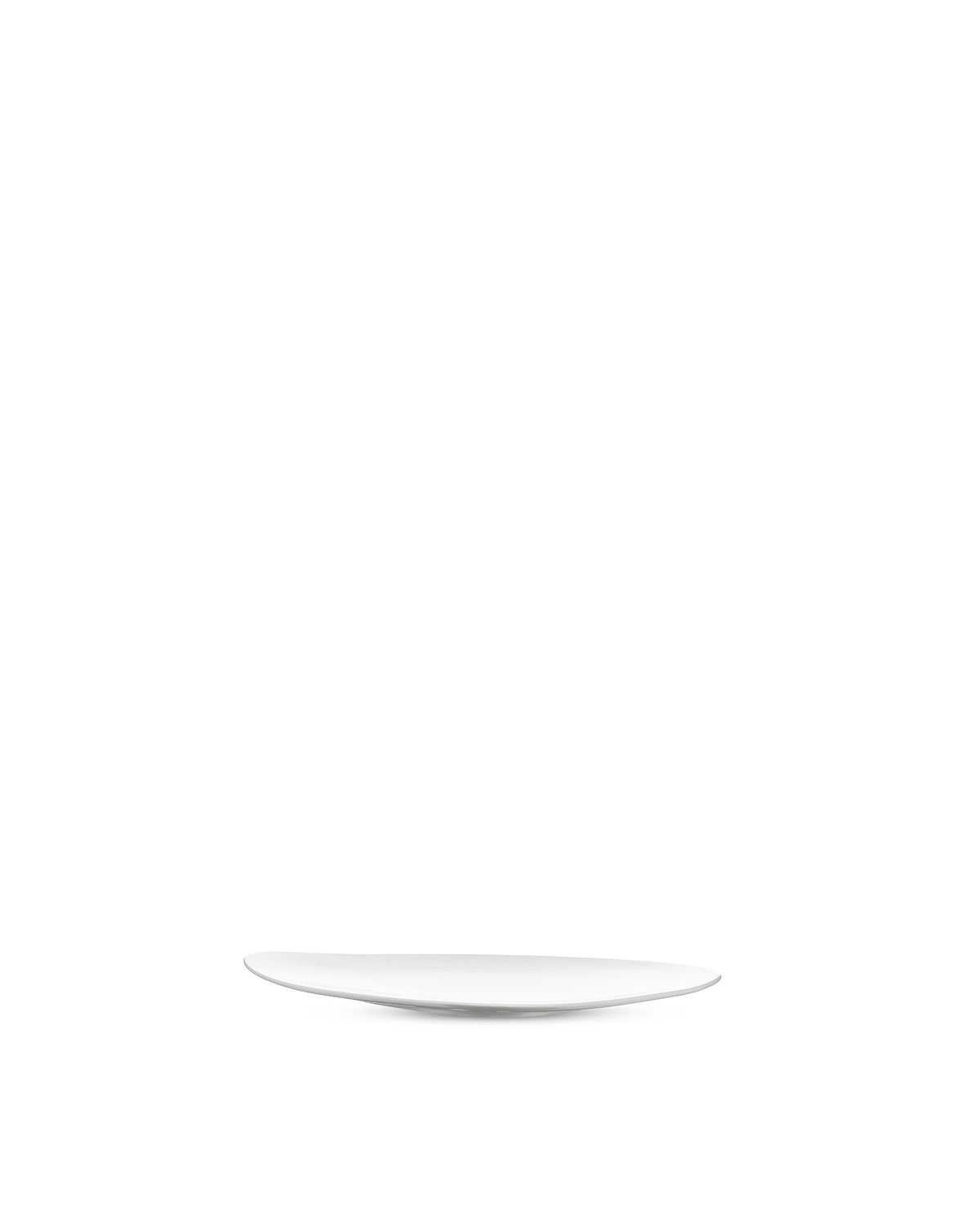 White oval shallow plate by Alessi, shown from a slight side angle.