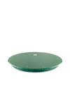 Round green kitchen scale by Alessi with a ribbed base and two subtle icons on the surface.