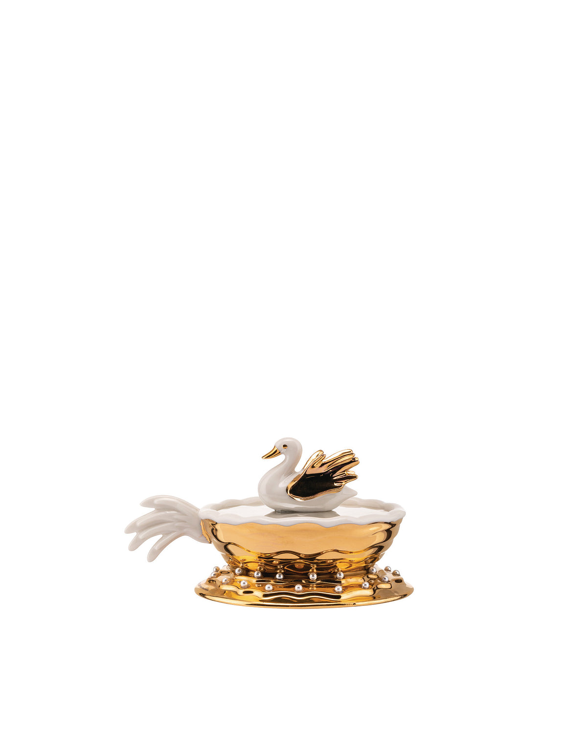 White and gold decorative swan container by Alessi with pearl accents and a ruffled edge.