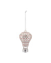 White and silver hot air balloon ornament by Alessi with a checkered pattern and red crystal embellishments, hanging from a thin chain.