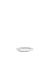 White ceramic plate by Alessi with a decorative scalloped and textured rim.