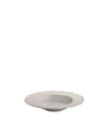 Light grey shallow serving bowl with scalloped edge by Alessi, presented at an angle.