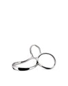 Polished metal serving piece by Alessi with an abstract handle and two open, fluid loops.