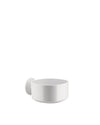 Glossy white cylindrical wall-mounted holder by Alessi, seen from a slightly elevated front angle.