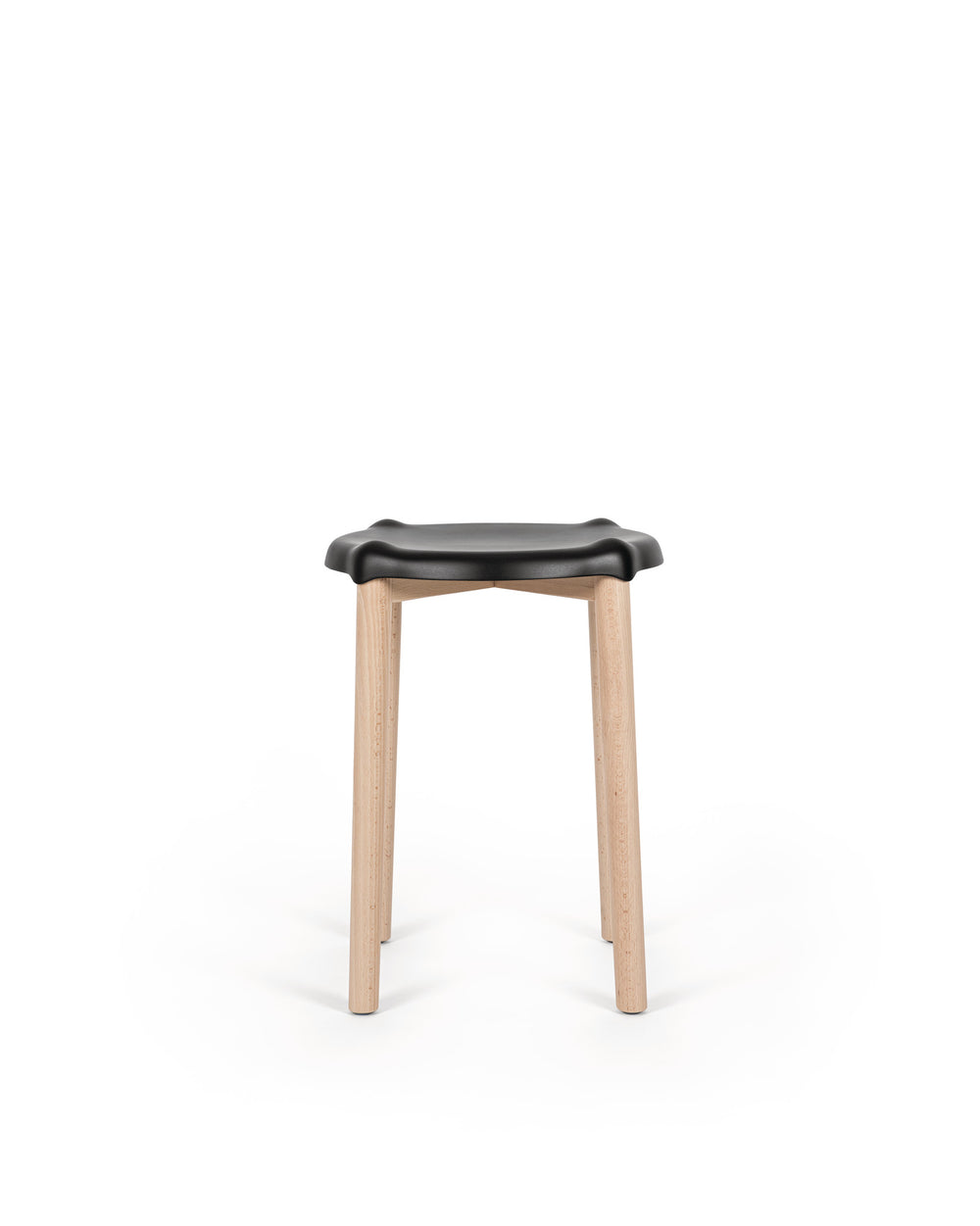 Black-seated stool by Alessi with a distinctive wavy seat and natural light wooden legs on a white background.