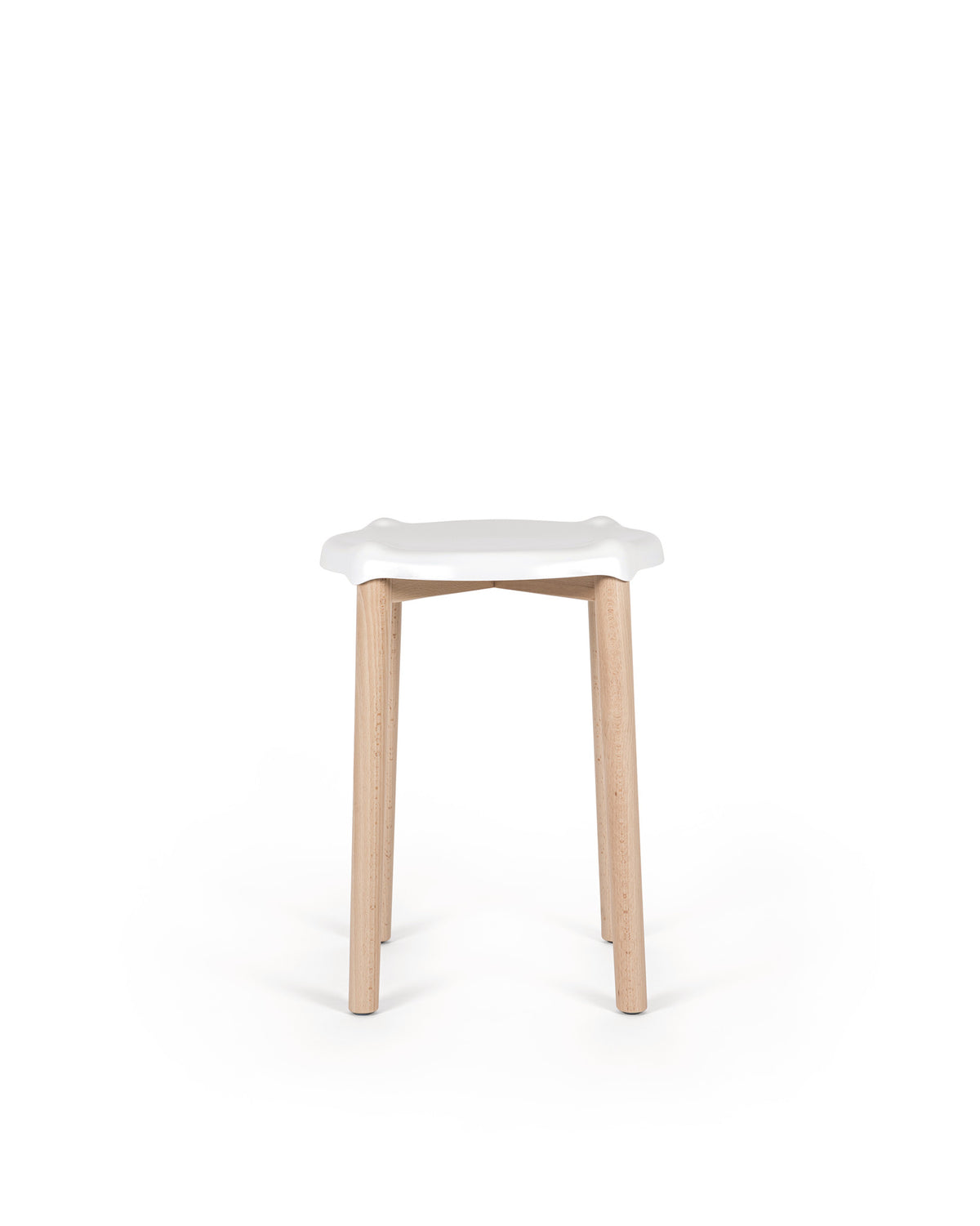White and wood stool by Alessi with a wavy-edged white seat and natural light wood legs, front view.