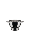 Silver metallic colander by Alessi with two curved handles, a pedestal base, and perforated drainage holes.