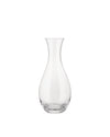 Clear glass carafe by Alessi with an elegant, curved silhouette on a white background.
