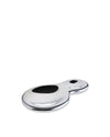 A polished chrome dish by Alessi, featuring an irregular, fluid shape with two black oval depressions.