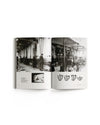 Open book by Alessi, showcasing vintage factory photographs and teapot designs.