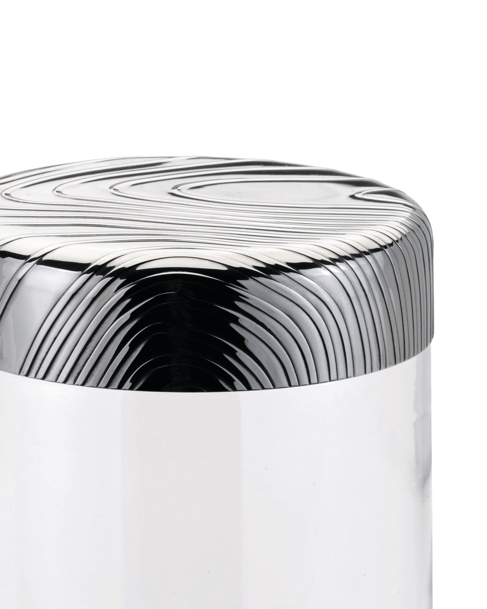 Silver metallic 'Veneer' by Alessi featuring concentric wavy grooves and a high-gloss finish.