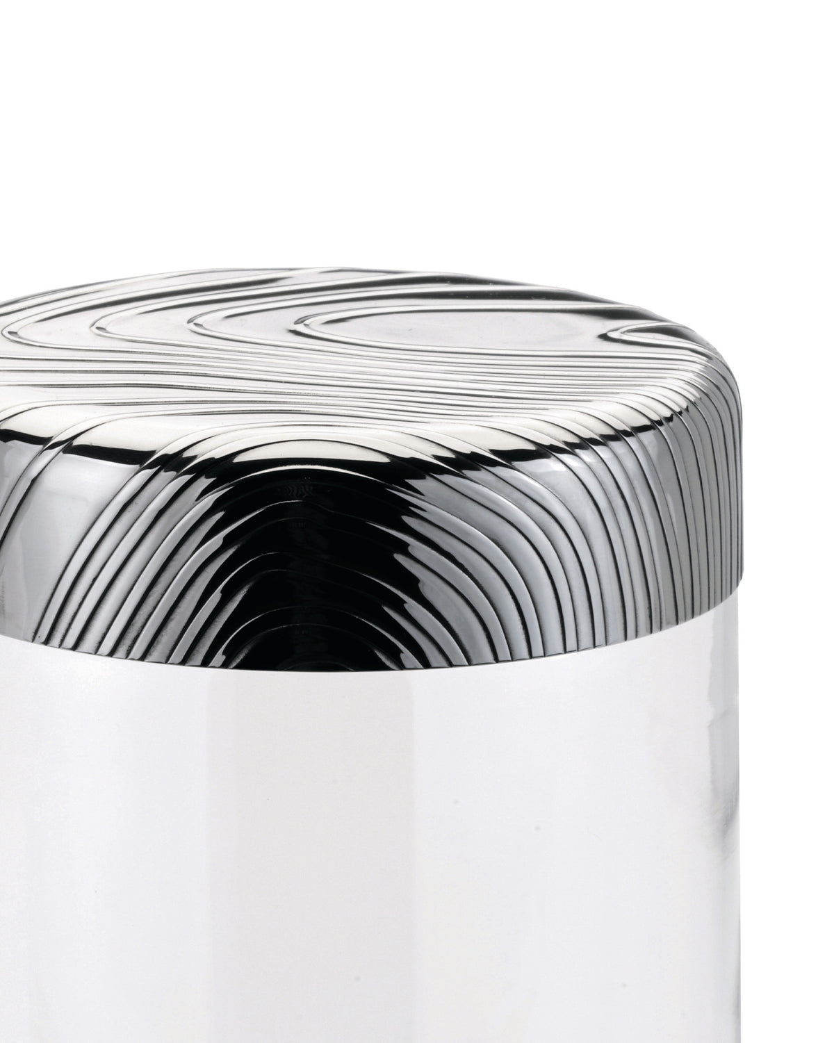 Silver metallic 'Veneer' by Alessi featuring concentric wavy grooves and a high-gloss finish.