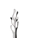 A silver polished metal decorative stand by Alessi with abstract coral-inspired branches, shown in a cropped view.