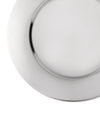 White charger plate by Alessi with a polished silver-colored rim, shown cropped.