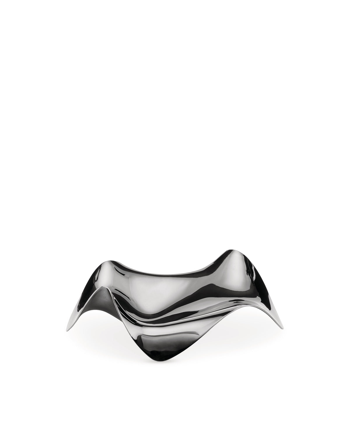 Sculptural polished metal bowl by Alessi with a wavy, reflective surface.