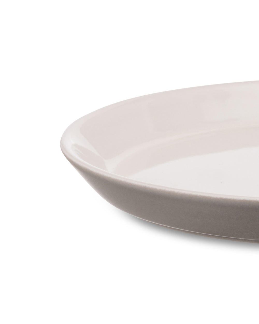 Light grey shallow bowl by Alessi, with a glossy finish and a contrasting white interior.