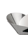 Shiny silver metallic basket by Alessi with a modern, sculptural design of overlapping, curved panels.