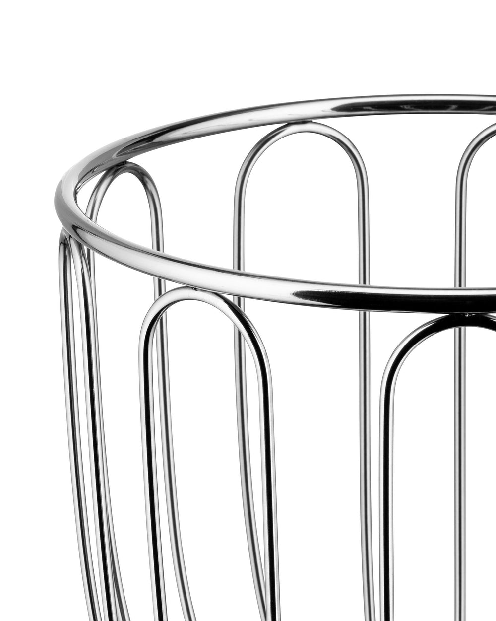 Cropped view of a chrome metal wire basket by Alessi, with repeating arched wires and a reflective finish.