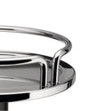 Chrome basket by Alessi featuring a perforated round base and shiny tubular rails, in a close-up.