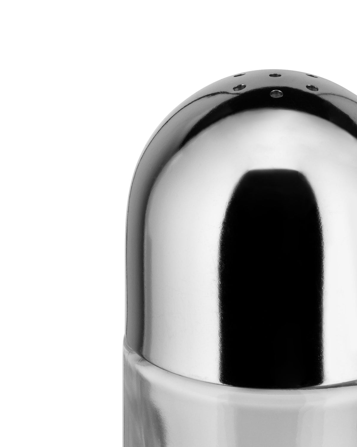 Metallic salt and pepper shaker by Alessi with a shiny, domed top featuring small holes, cropped close-up.