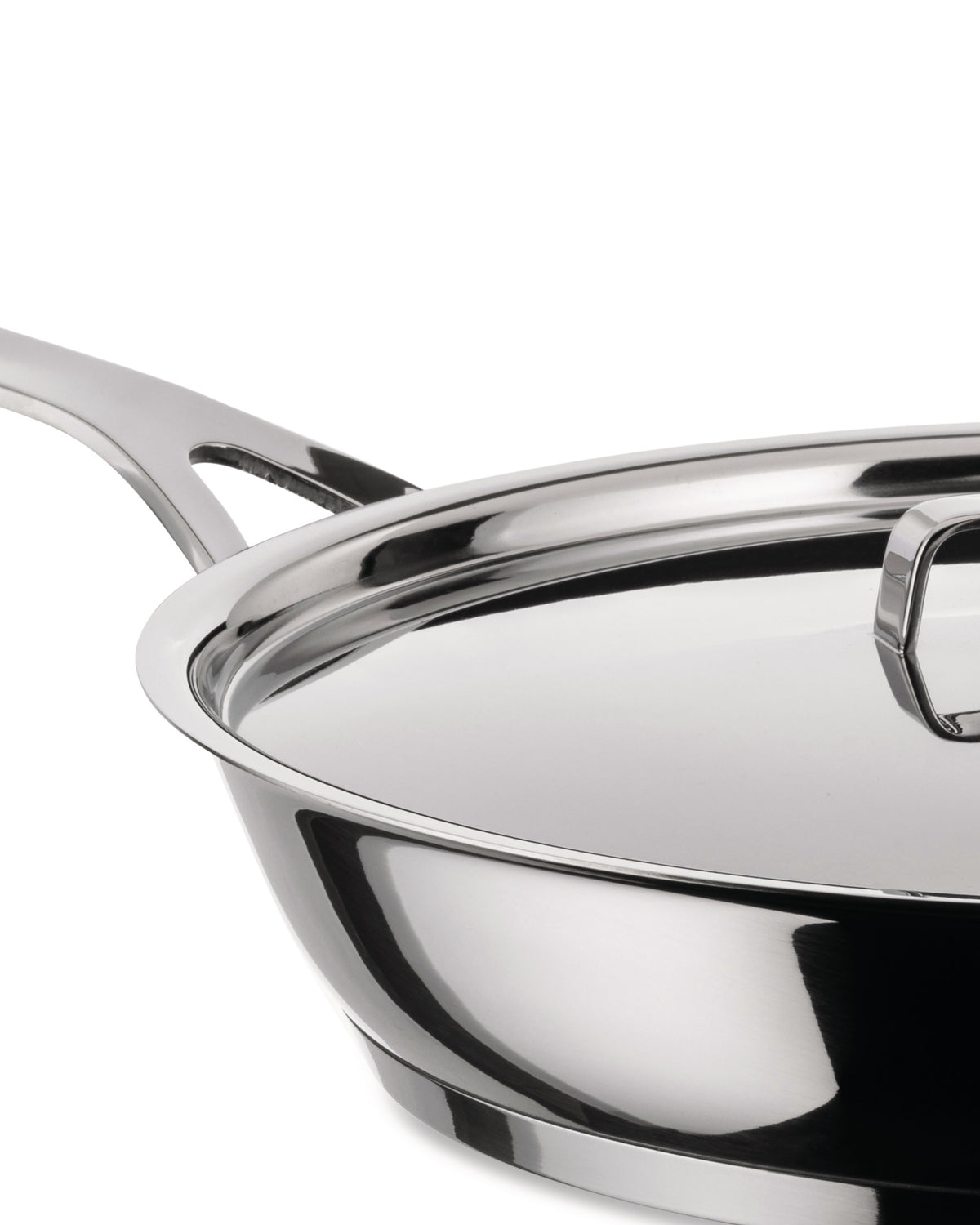Stainless steel frying pan with lid by Alessi, in a close-up, angled view highlighting its shiny, reflective finish and handle.