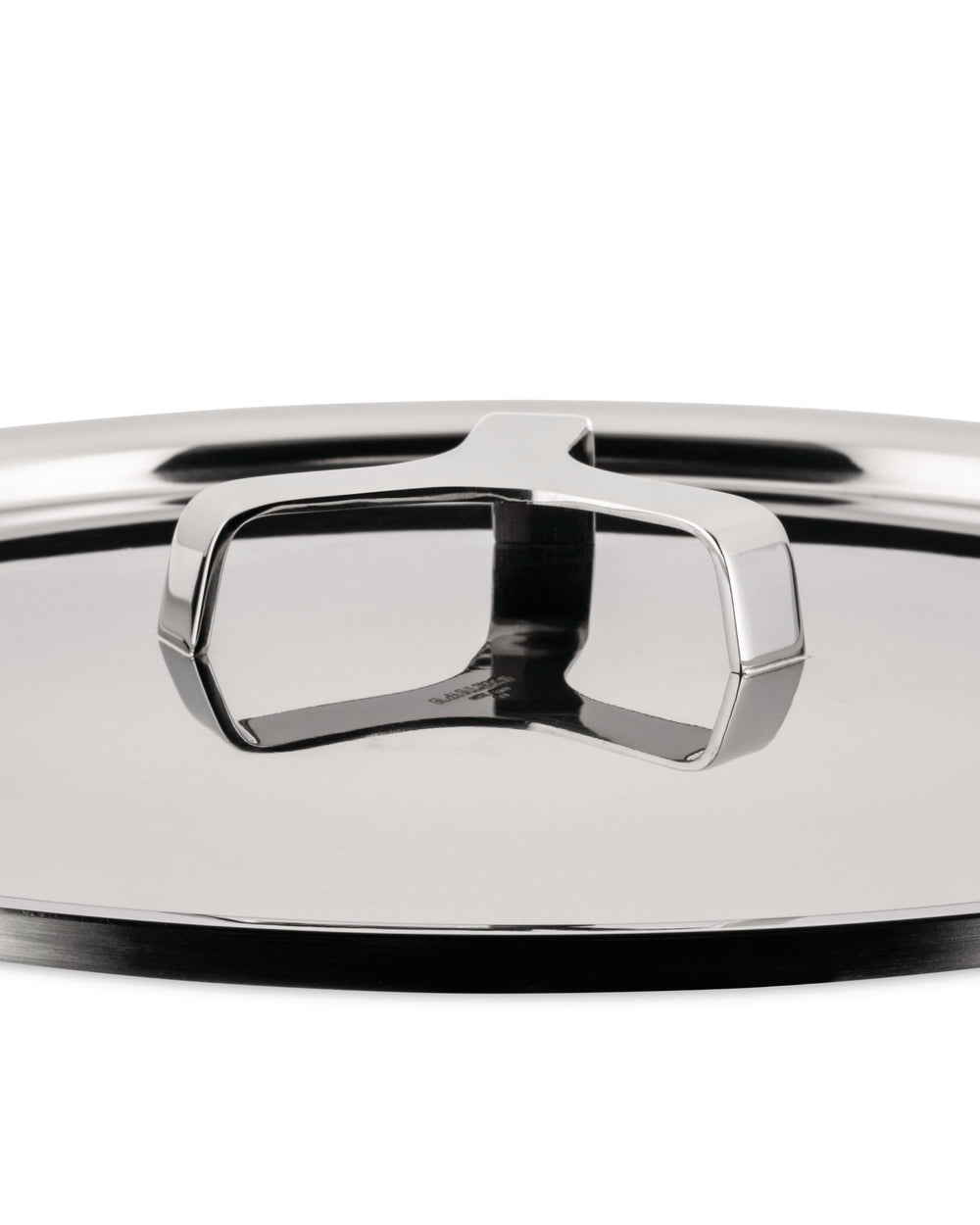 Polished stainless steel pot lid by Alessi, featuring a unique open-frame handle, in an angled close-up.
