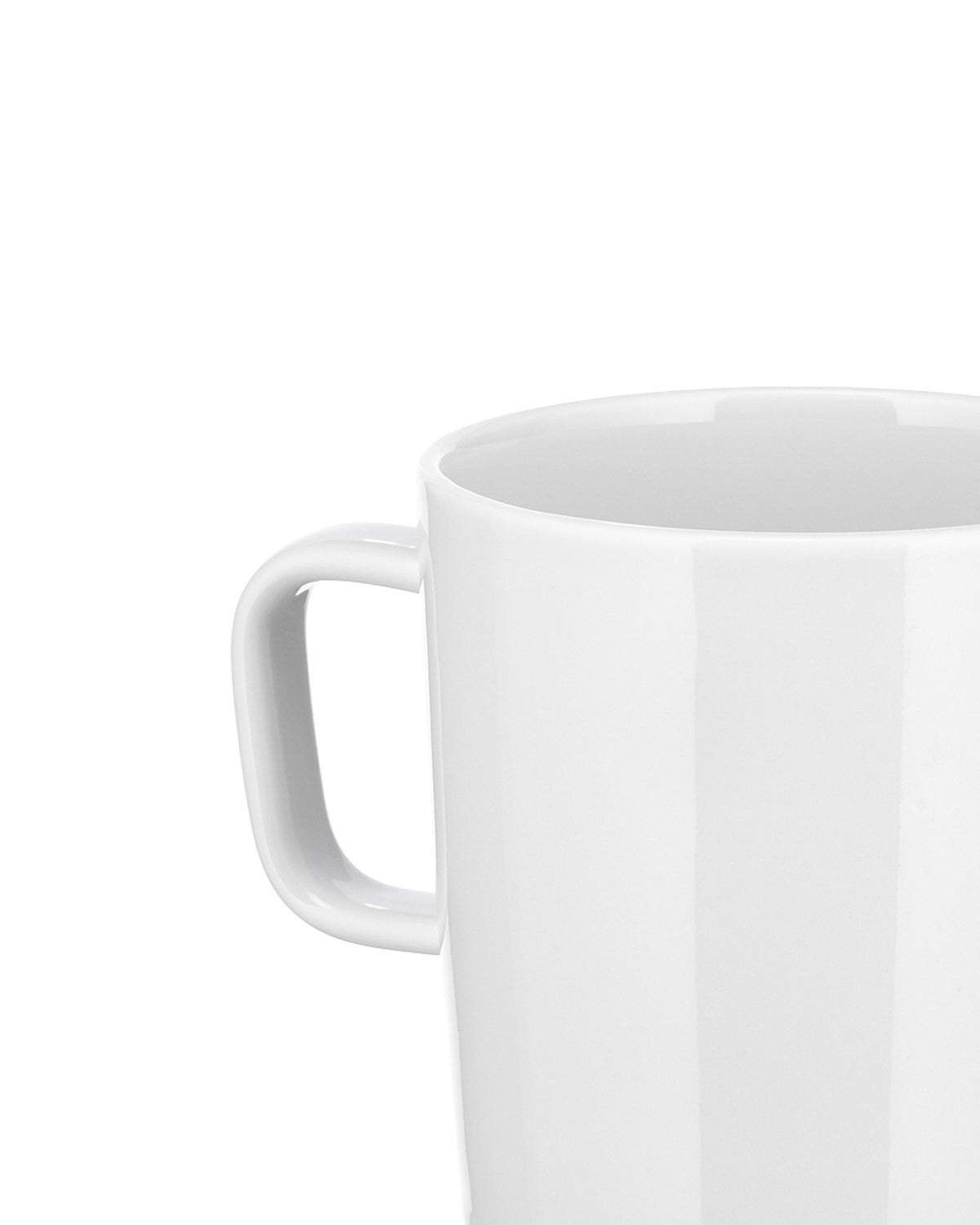 White ceramic mug by Alessi with a glossy finish and curved handle, cropped close-up.