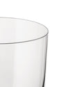 A clear glass by Alessi, with a smooth, simple cylindrical form, shown in a cropped close-up.