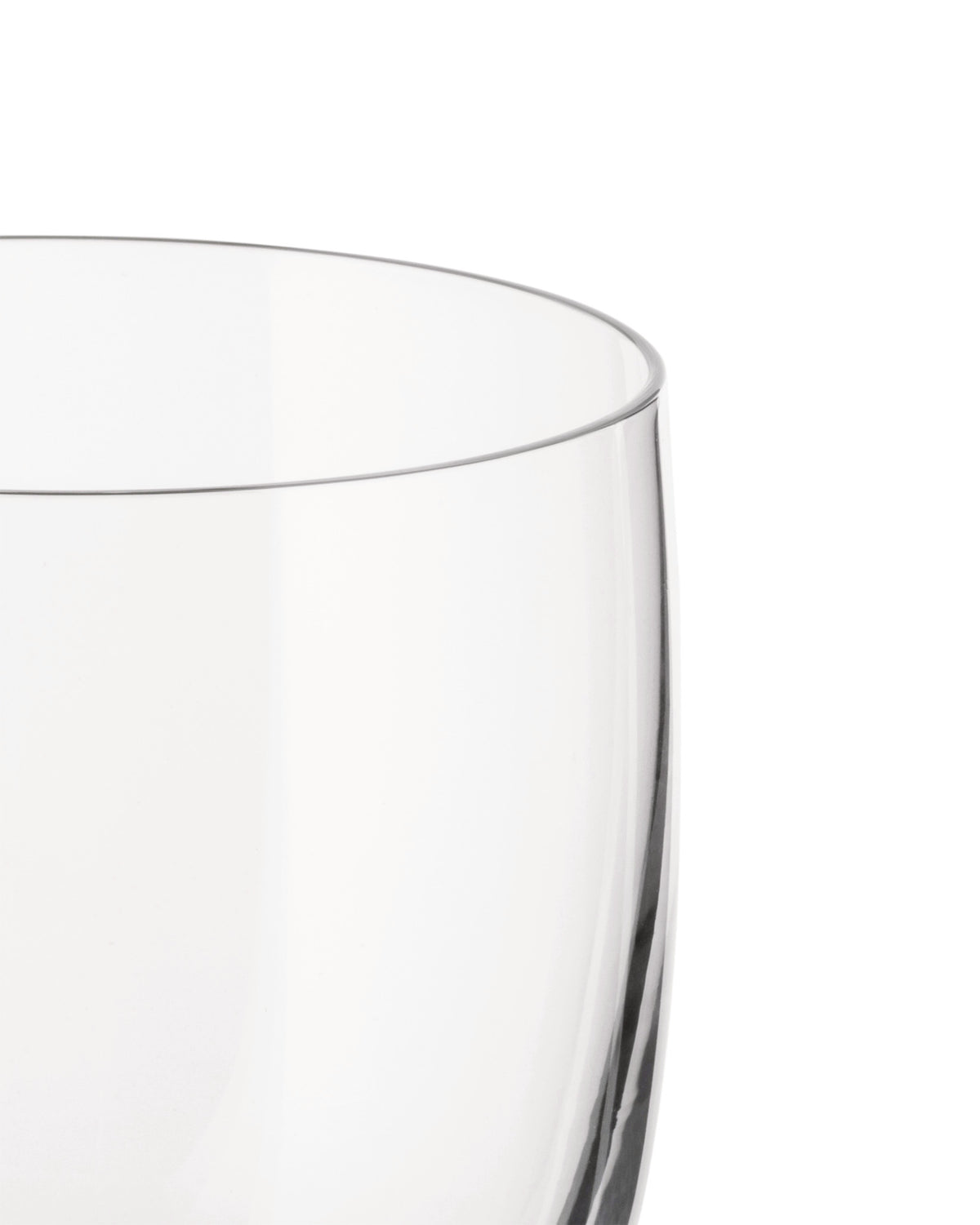 Clear glass by Alessi, showing the upper rim and curved side in a cropped view.