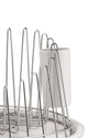 Chrome-plated steel dish drainer by Alessi featuring wavy rods and a white base with a utensil holder.