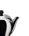 Polished stainless steel teapot by Alessi, with a black spherical lid knob and elegant curved spout, cropped view.
