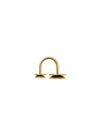 Gold Acta by Alessi, a U-shaped metal object with two textured flat bases on a white background.