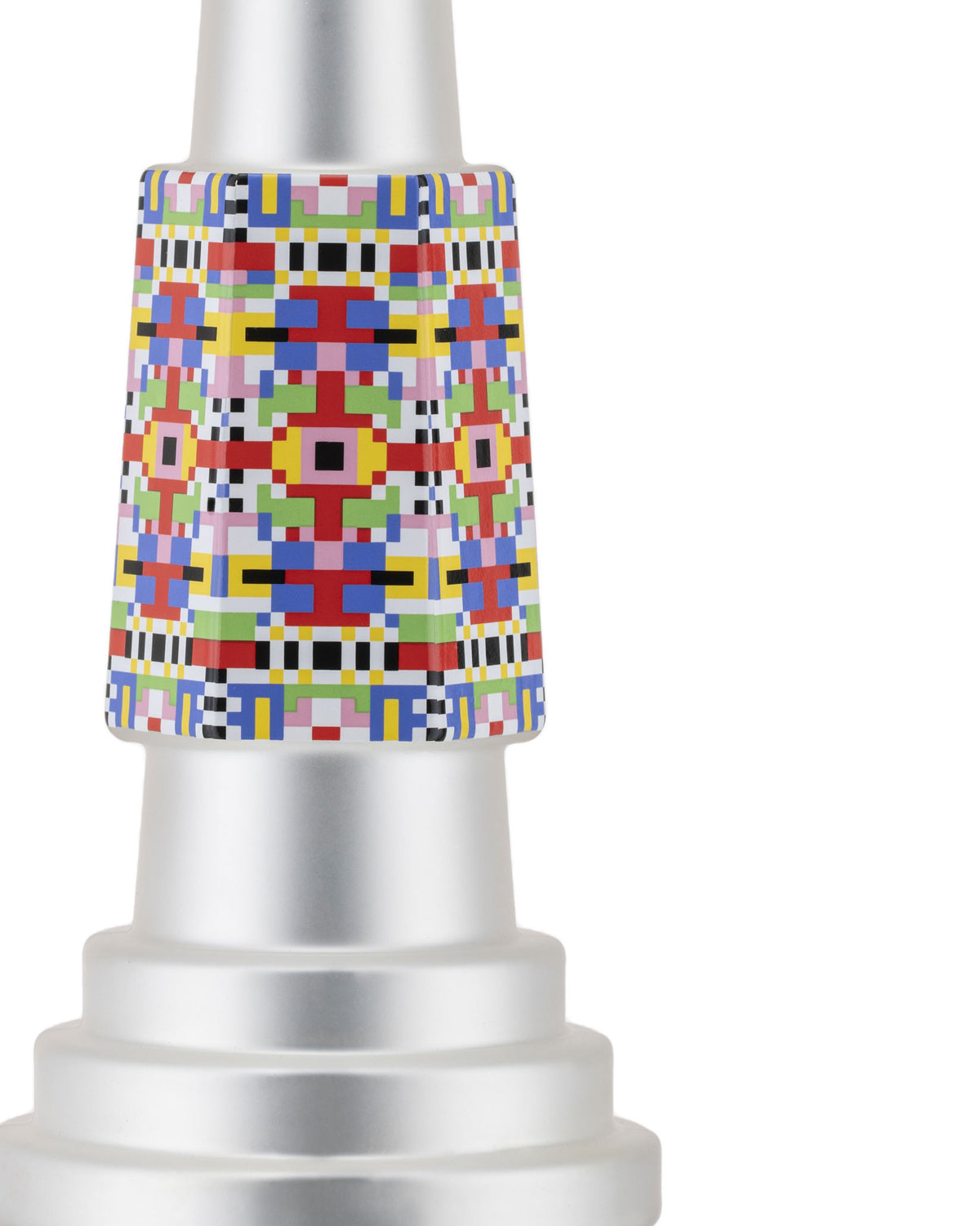 Silver and colorful pixelated Christmas tree ornament by Alessi with a frosted, tiered base.