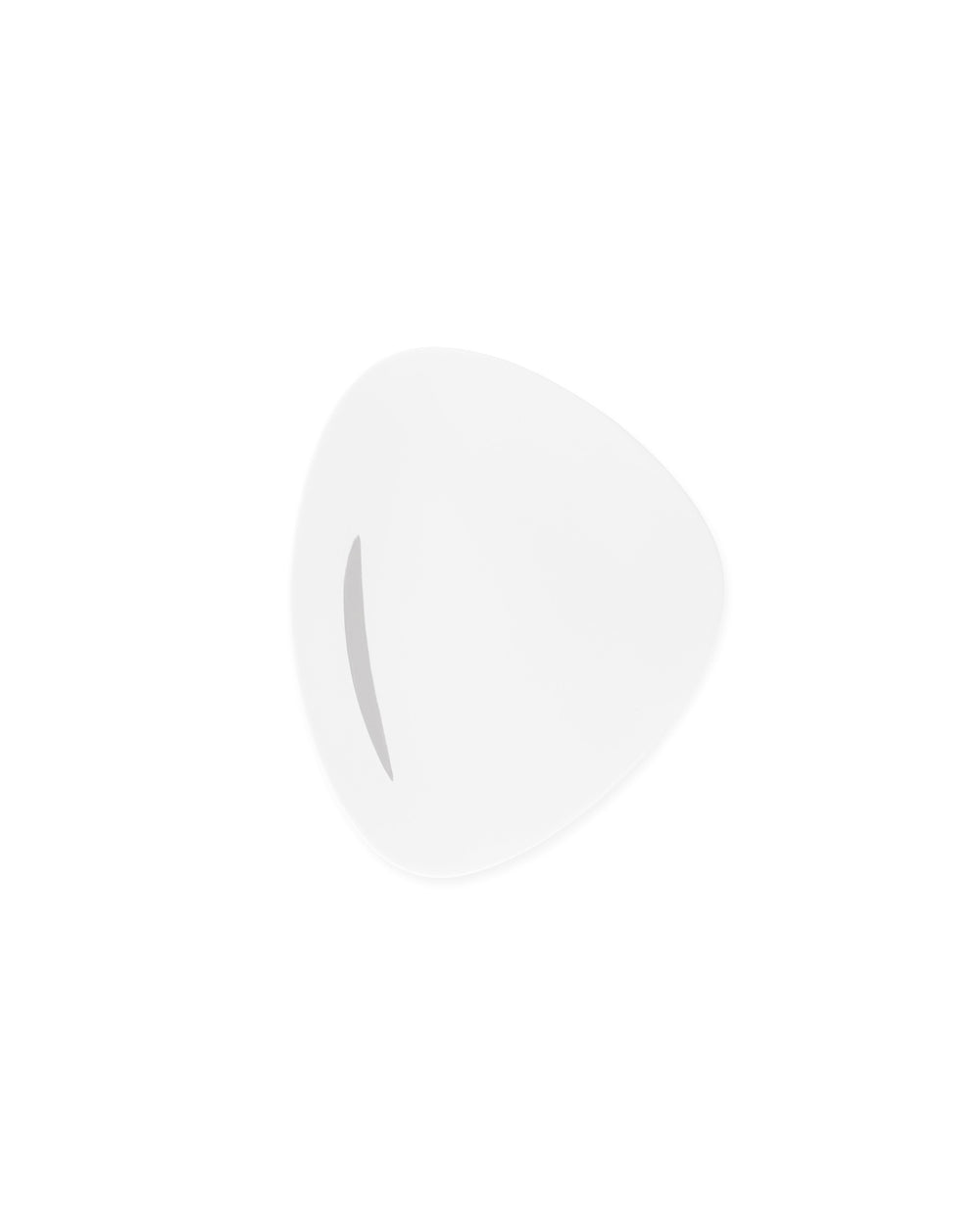 White serving dish by Alessi, with a subtle curved gray detail on its smooth, angled surface.