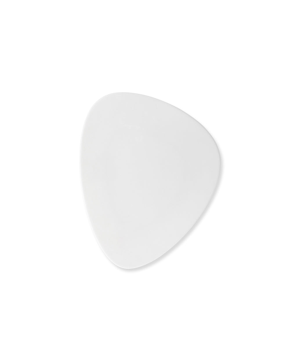 White organic-shaped plate by Alessi, part of the Colombina collection, viewed from above.