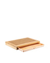 Light brown wooden chopping board by Alessi, with parallel slats and an extended light beige crumb tray.
