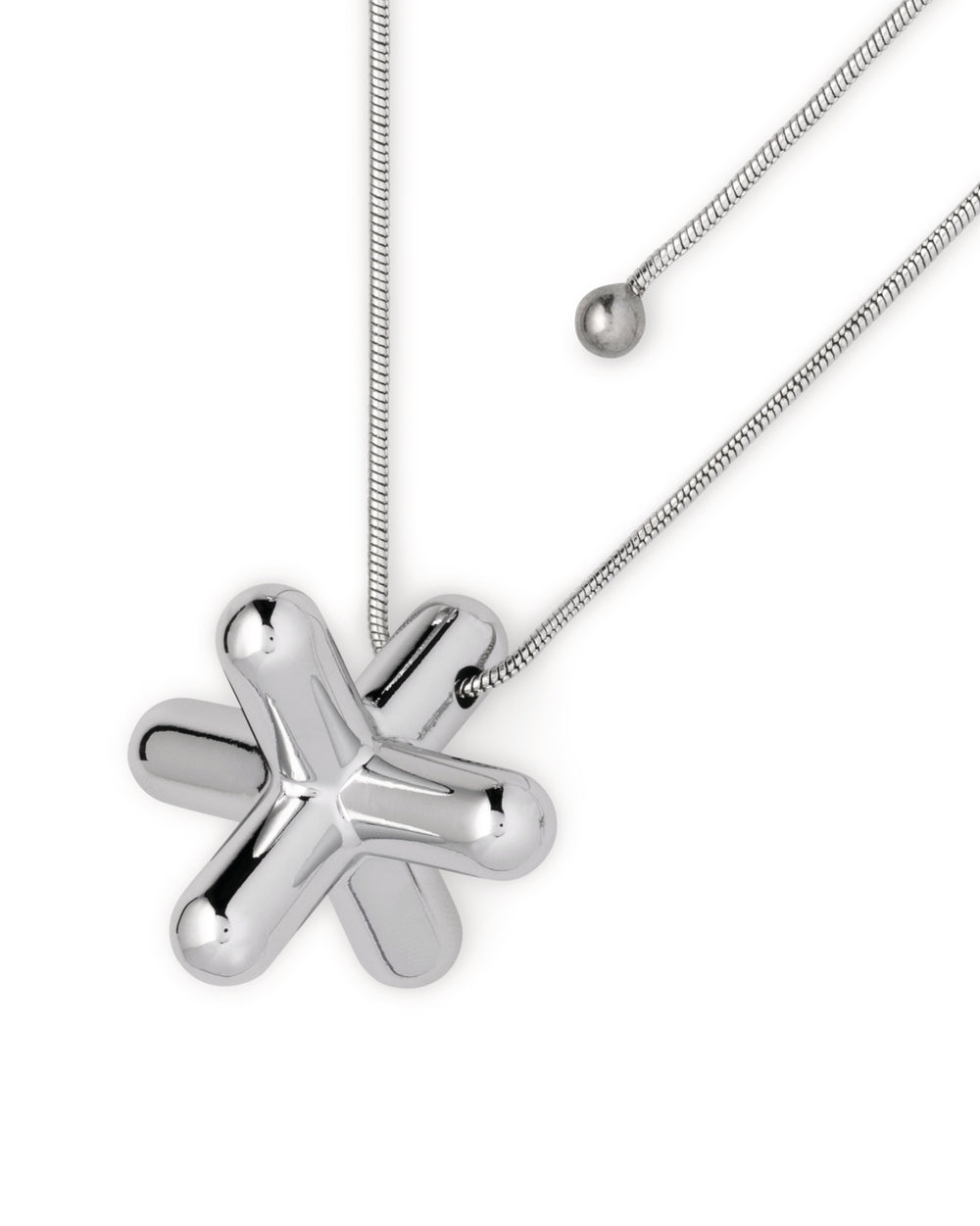Shiny chrome tripod trivet by Alessi, featuring a jack-like shape and thin silver chains.