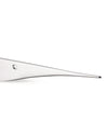 Silver-toned, flat, tapered metal utensil by Alessi featuring a small circular hole, cropped side view.