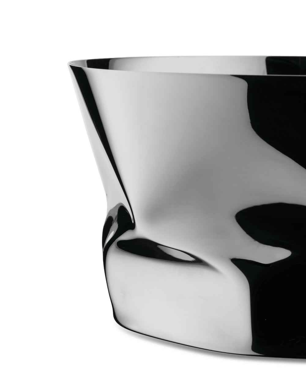 Crinkled silver metal bowl by Alessi, with a highly reflective surface and unique sculptural shape.