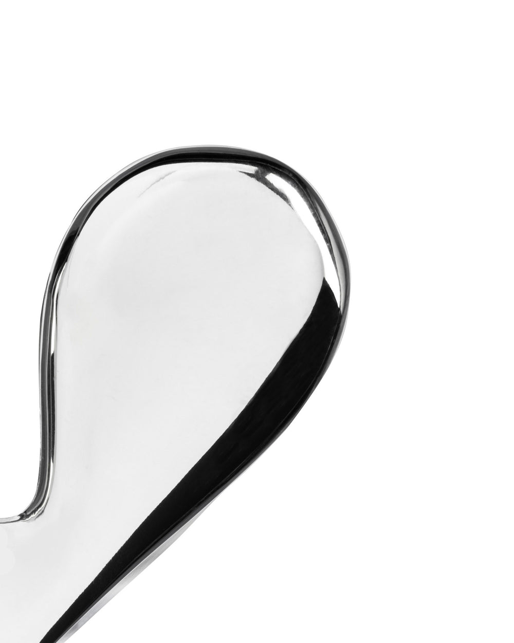 Polished silver-toned Nut Splitter by Alessi, with a smooth, curved, highly reflective surface, cropped against white.
