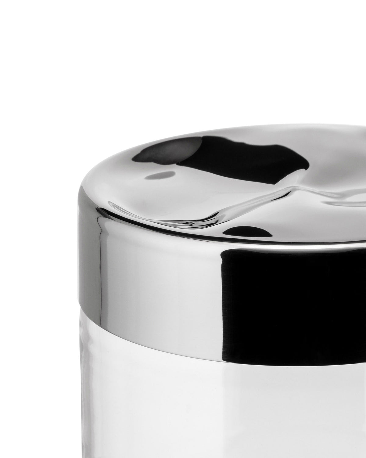 Clear glass storage jar by Alessi with a polished chrome wavy, sculptural lid.