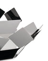 Silver geometric metal fruit bowl by Alessi, featuring an open, abstract design of interlocking reflective panels.